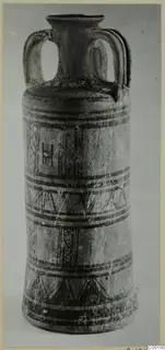 White Painted I amphora from Lapithos, with dark painted bands and geometric panels on a pale body