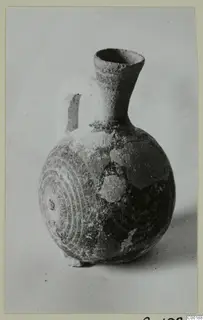White Painted I jug from Lapithos with a flaring neck and concentric circles on its round body