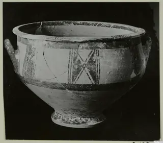 White Painted I bowl from Lapithos, with two small handles and dark painted bands and panels on a pale surface