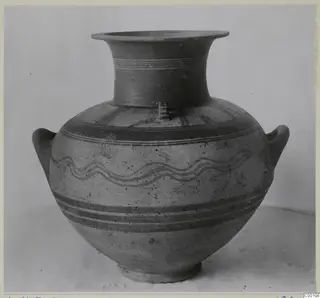 Two-handled White Painted I amphora from Lapithos with a flaring neck and painted bands and wavy lines