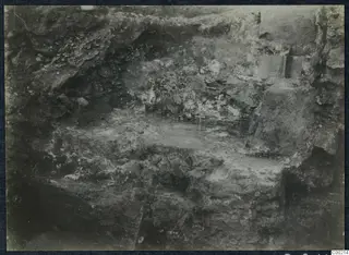 Excavated stone steps in a cut trench at Soli, with earth and rubble banks around them