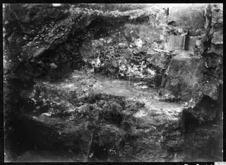 Excavated stone steps and tiers at the theatre at Soli, with rubble and earth banks around them