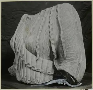 Marble sculpture fragment with carved drapery, found at Galini