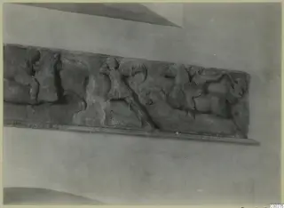 Marble relief from Soli with fighting figures, one carrying a round shield