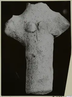 Terracotta figure body from Soli, a broken upper edge with two rounded bumps, against a black background
