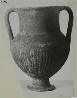 Pottery Plain White I-III: two-handled jar with a fluted lower body and ring foot