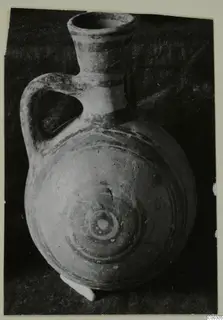 Pottery Bichrome II jug from Lapithos, Kastros tombs, with one handle and concentric painted rings on the body
