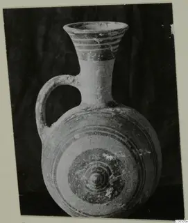 Pottery Bichrome II single-handled vessel from Lapithos, Kastros tombs, with banded neck and concentric circles on the body