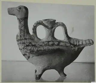 Bird-shaped pottery vessel with painted dark bands, from the Kastros tombs at Lapithos