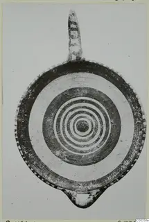 Pottery White Painted I bowl from Lapithos, seen from above, with concentric painted rings and a handle