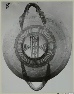 Shallow bowl with two loop handles, its interior painted with concentric rings and cross-hatched motifs, from Lapithos Kastros tombs