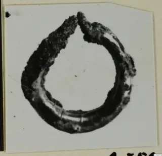 Corroded bronze ring-shaped adornment from Lapithos.