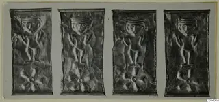 Four rectangular embossed metal plaques in a row, each with a raised figure with arms raised and a rosette motif below.