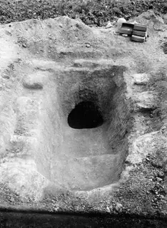 Dromos leading down to the dark entrance of Tomb 317 at Lapithos