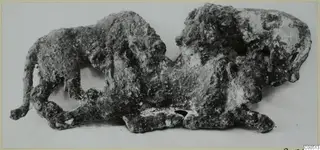 Corroded bronze relief of two animals, before restoration, from Vouni