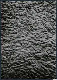 Close view of pick-marked rock surface in the ceiling of Tomb 14 at Vouni