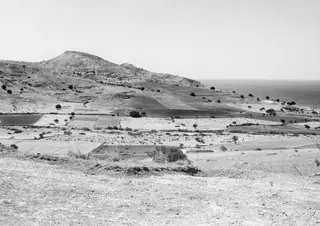 View across fields and low hills from the acropolis of Soli towards the sea at Vouni.