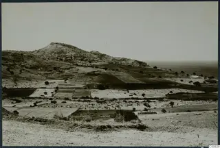 View from the acropolis of Soli across fields and hills toward the sea, with Vouni on the hill ridge