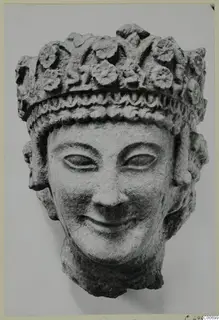 Limestone head fragment with a flower-decorated crown, from Vouni