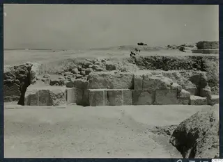 Squared stone blocks of the theatre at Soli during excavation, with loose rubble above them