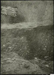 Excavation trench at Plakes, Lapithos, with stones embedded in the soil face