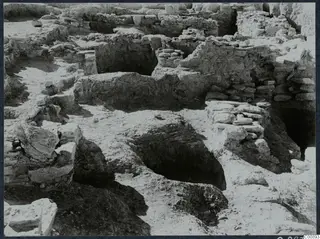 Excavated stone walls and room outlines at the Idalion acropolis, seen from above.