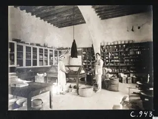 Rosa Lindros and Perikles Kaplanis in a storeroom at Lapithos