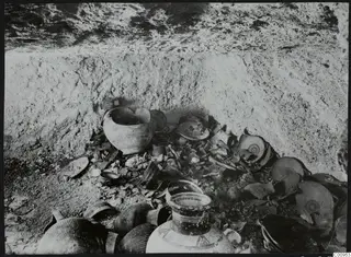Tomb 428 at Lapithos Kastros: chamber interior with pottery and sherds lying in situ during excavation