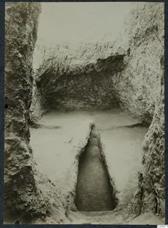 Excavation cutting at Idalion with a narrow sunken trench running down the floor between earth banks