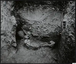 Tomb 602 at Lapithos, interior with a skeleton and pottery vessels in situ