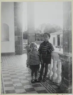 Stefan Gjerstad and Martin Gjerstad standing on a tiled veranda beside stone pillars, Nicosia.