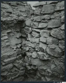 Stone wall with irregular blocks and a narrow gap at the Idalion Acropolis excavation.