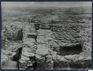 Excavated stone walls on the Acropolis at Idalion, with rolling hills in the background