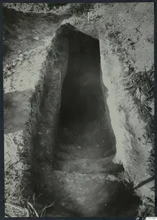 Stepped dromos cut into earth leading down to the entrance of Tomb 22 at Marion.