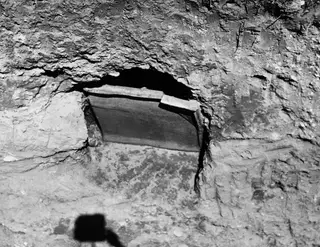 Unopened niche III in the rock-cut wall of Tomb 32 at Marion, its opening closed by stone slabs.