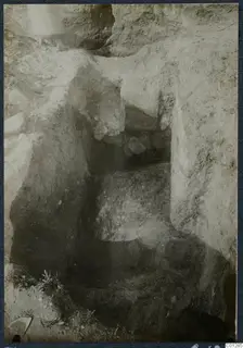 Tomb 47 at Marion during excavation, showing a cut passage and chamber opening in soil