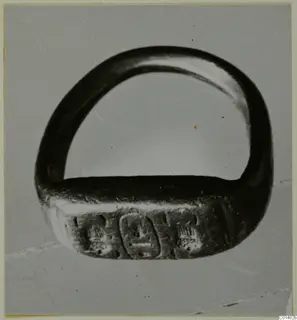 Ring with an engraved bezel bearing incised signs, from Ayios Iakovos