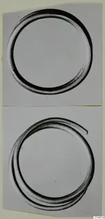 Two photographic views of metal rings, one a closed circle and one with overlapping coils