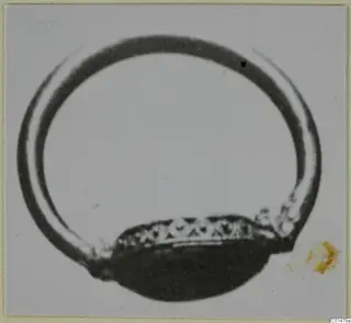 Finger ring with an oval bezel and a patterned band, from the Marion tomb finds