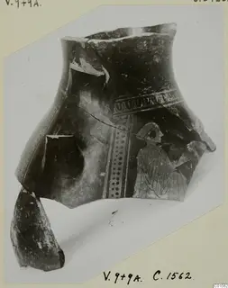 Fragments of a pottery vessel from Vouni with a loop band, dotted panel and bird motif, on a photo mount
