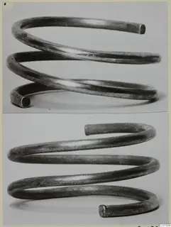 Two photographs of a spiral metal wire coil, a find from Vouni