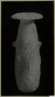 Alabaster vase from Vouni, with a broad flat disc rim, narrow neck and two small handles on the shoulder