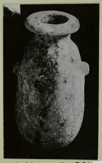 Alabaster vase with a wide flat rim and two small lug handles, from Vouni