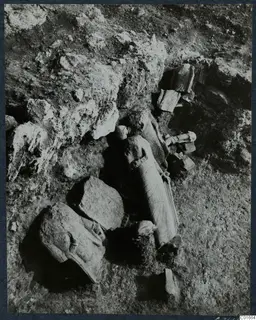 Statues lying in the soil in Room 129 at Vouni, seen from above during excavation