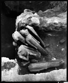 Stone sculptures lying in situ in the central pit at Kition