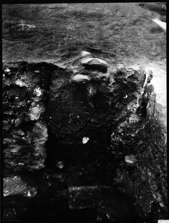 Central pit at Kition with a soil profile beside a statue deposit, seen from above