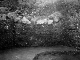 Soil profile in the eastern part of the Bamboula at Kition, with stone blocks set into the excavated face