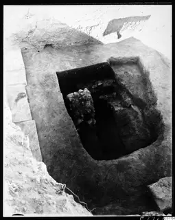 Central pit at Kition, excavated from the east, showing rubble and large stones in the pit floor