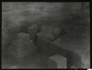 Stone pedestals and squared blocks standing in an excavation at Kition