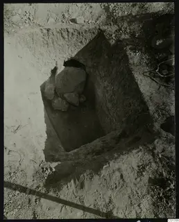 Excavation cutting with large stones at Kountoura Trachonia